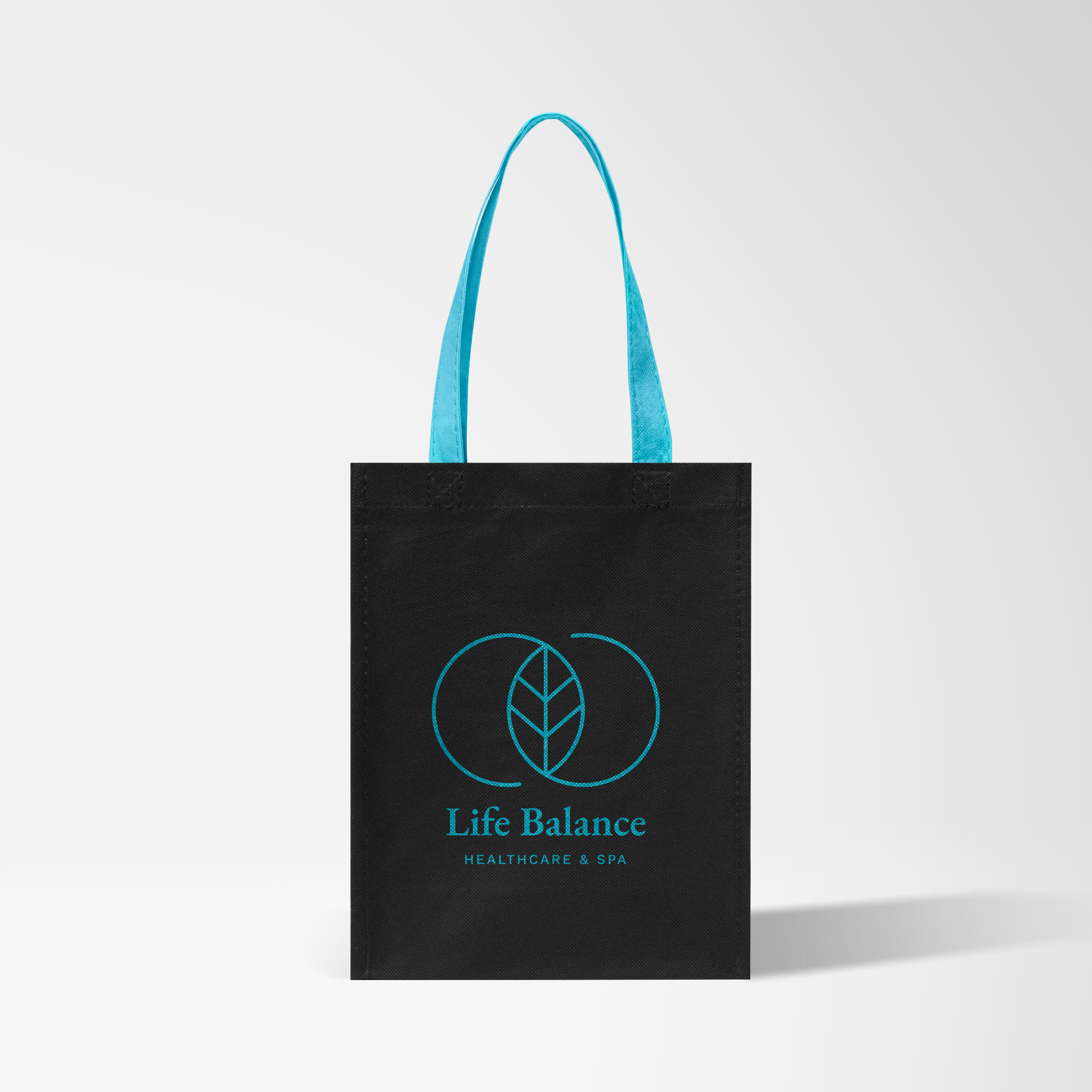 Black promotional tote bag with blue handles and blue logo printed on display.