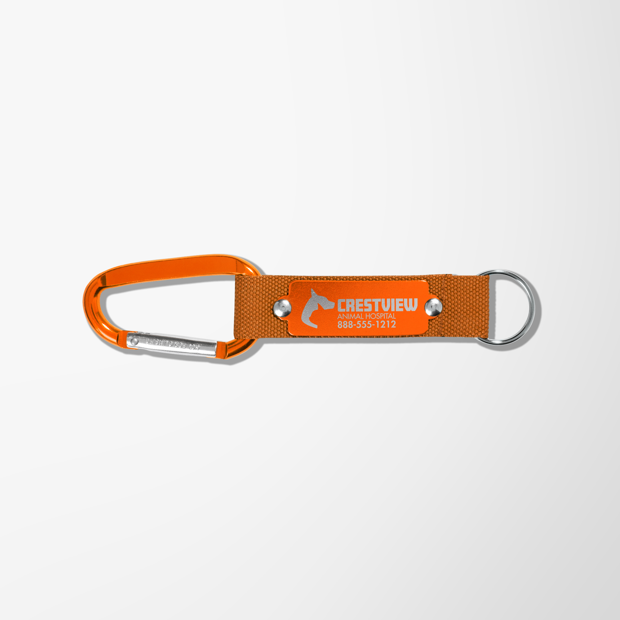An orange carabiner keychain on display available for customization.